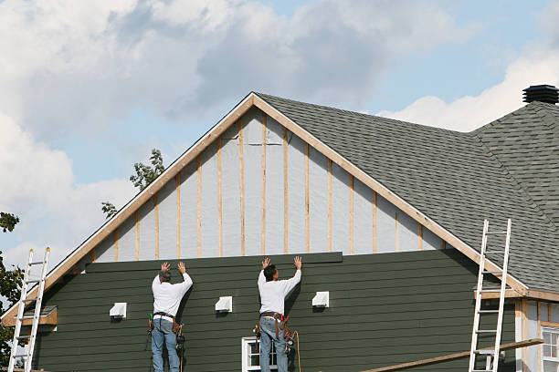 Professional Storm Damage Siding Repair technician working in Lakeville, OH